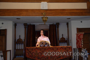 IDAHO. Boise. Asian Jewish girl standing at bimah in synagog