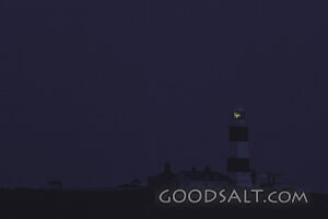 Lighthouse Beacon in the Night