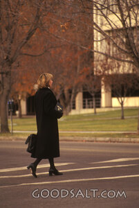 Woman Crossing the City Street