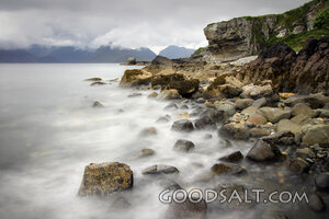 Rocky Shore Beneath Storm Clouds