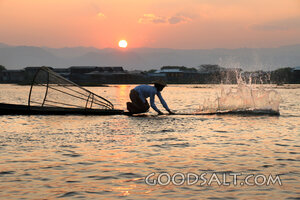 Fisherman Casting Nets at Sunset