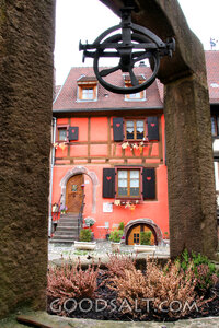 Old Village Courtyard Through the Well Arch