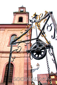 Historic Church Tower and Wrought Iron Sign