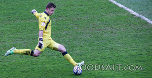 Goalkeeper Clearing the Ball