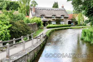 Thatched Cottage by the Village Stream