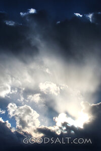 Heavenly Light Through Storm Clouds