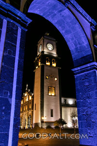 Church Clock Tower Through Stone Arch