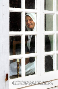 Woman with Candle at the Window