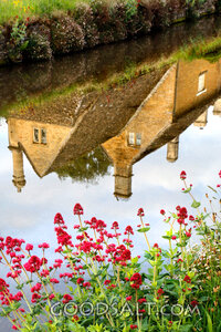 Cottages Reflected by Still Waters