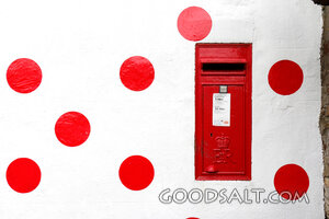 Red Post Box in White Wall