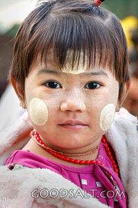 Child with Thanaka Face Paste