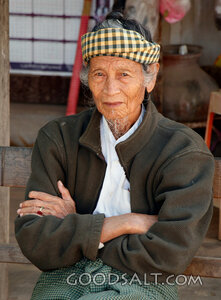 Elder Seated with Quiet Dignity