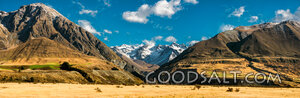 Alpine Valley Beneath Snow-Crowned Peaks