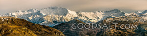 Snow-Crowned Mountain Range at Sunset