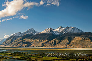Snow-Crowned Mountains and River Valley