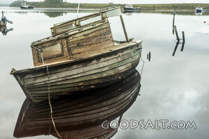 Weathered Fisherman’s Boat at Still Harbor