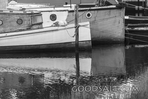 Moored Wooden Boats at Still Harbor