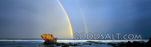 Oceanscape With Large Rock and Two Rainbows