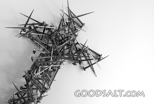 Pile of nails forming a cross shape