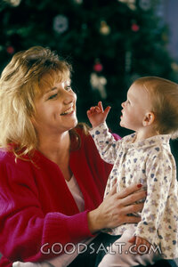 Mother and Child by the Christmas Tree