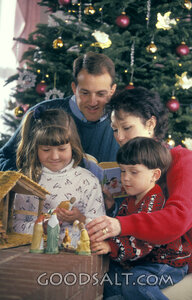 Family Reading the Christmas Nativity