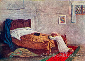 poor child little girl kneeling next to bed praying