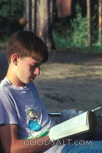 Teen Reading Scripture Outdoors