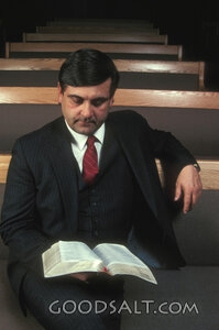 Pastor Reading Scripture in the Sanctuary