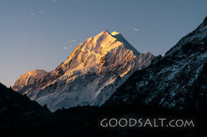 Tall mountain peak covered in snow.