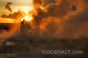 WYOMING. Yellowstone National Park. Sunset through Spasm Gey
