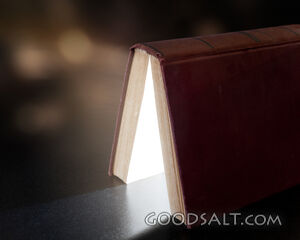 An Open Bible With Glowing Light
