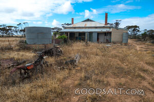 derelict farmhouse in dry country