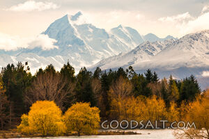 early morning sky over huge snow-clad peak