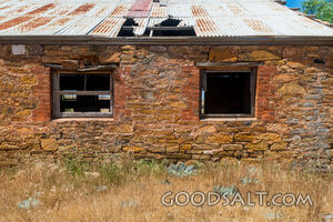 External window in stone house wall.