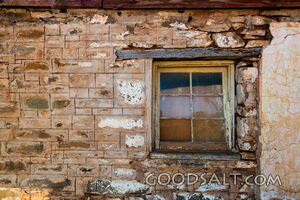 External window in stone house wall.