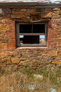 External window in stone house wall.