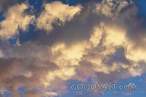 Fluffy Yellow Clouds in a Blue Sky