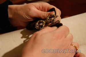 IDAHO. Boise. Hands fastening Torah girdle or binder. MR