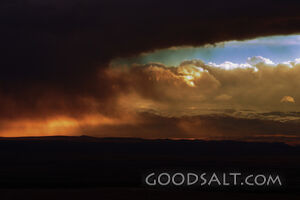 IDAHO. Boise. Storm clouds at sunset over Boise foothills fr