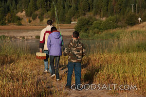 IDAHO. Smith’s Ferry. Man and kids fishing on autumn morning