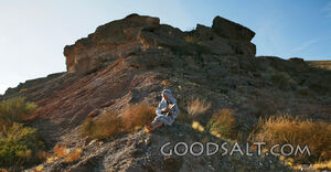 Isrealite Man Sits on Side of Mountain