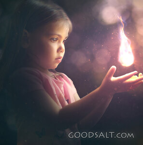 Little Girl Holding a Light