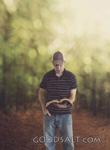 Man Reading the Bible