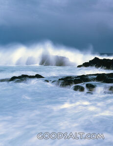 ocean waves crashing on rocks
