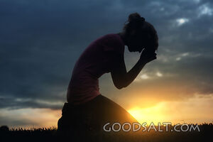 Praying at Sunset