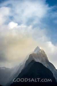 Prominent alpine peak with cloud effects.