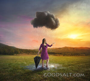 Single Cloud Raining on a Woman