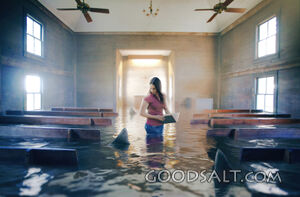 Woman with sharks inside a church